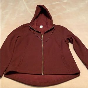 Burgundy zip warmup jacket.